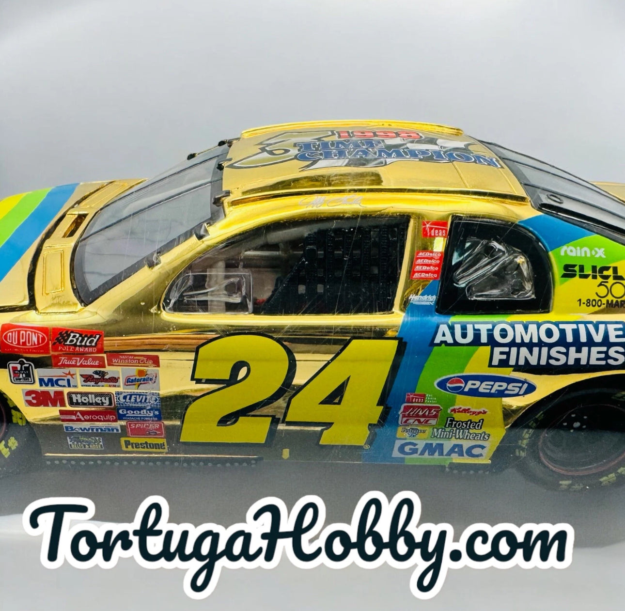 1:24 ACTION 1998 #24 DUPONT 24K GOLD CHROME 3X TIME CHAMPION JEFF GORDON MIB