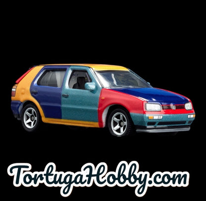 2023 - Matchbox Collectors - 1995 Volkswagen Gold MK3 Harlequin. First Edition